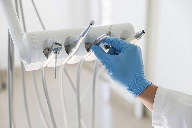 Professional Tooth Extraction technician working in Jackson, MI